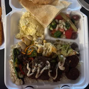 Kafta Kabob Platter with garlic sauce.