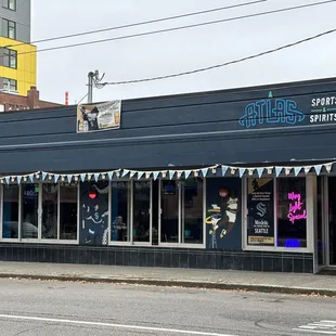 Finally an unobstructed shot! Matching lights and neon signs!  view from across the street