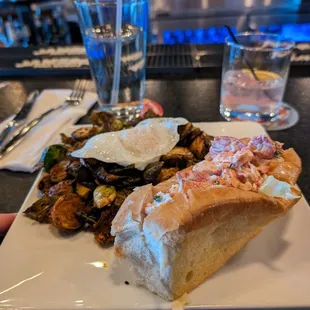 Lobster roll with sprouts