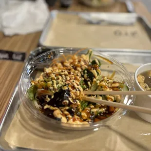 Lil Poke - rise base, crab mix, cucumbers, broccoli, spicy mayo, eel sauce, sesame seeds (comes with mixed greens and carrots)