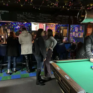 a pool table in a bar