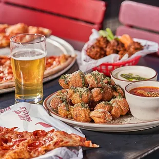 Atomic Cowboy home of Denver Biscuit Co &amp; Fat Sully&apos;s NY Pizza, loaded garlic knots beer and pizza
