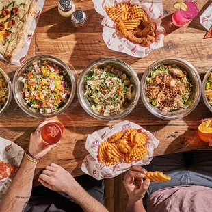 Atomic Cowboy home of Denver Biscuit Co &amp; Fat Sully&apos;s NY Pizza, fresh salads