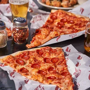 Atomic Cowboy home of Denver Biscuit Co &amp; Fat Sully&apos;s NY Pizza, pizza by the slice