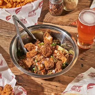 Atomic Cowboy home of Denver Biscuit Co &amp; Fat Sully&apos;s NY Pizza, chicken bacon ranch salad
