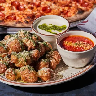 Atomic Cowboy home of Denver Biscuit Co &amp; Fat Sully&apos;s NY Pizza, loaded garlic knots