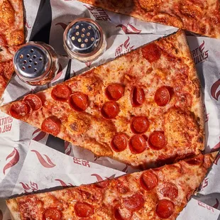 Atomic Cowboy home of Denver Biscuit Co &amp; Fat Sully&apos;s NY Pizza, pizza by the slice