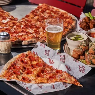 Atomic Cowboy home of Denver Biscuit Co &amp; Fat Sully&apos;s NY Pizza, 26&quot; hand-tossed pies