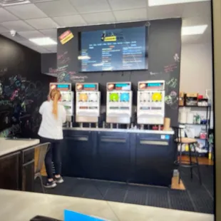 a woman standing at the counter