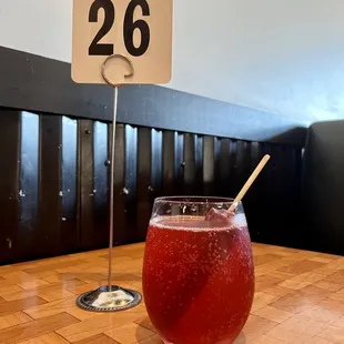 Cranberry mimosa with a grape popsicle