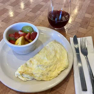 Kids American Cheese Omelette &amp; a grape mimosa (lol)