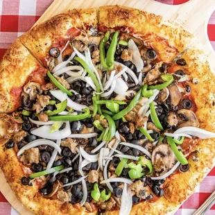 a pizza on a cutting board