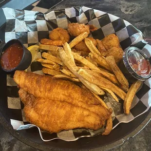 Seafood plater with flounder, shrimp, crab balls and fries (you can pick your fish)