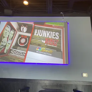 Large screen with sports projected