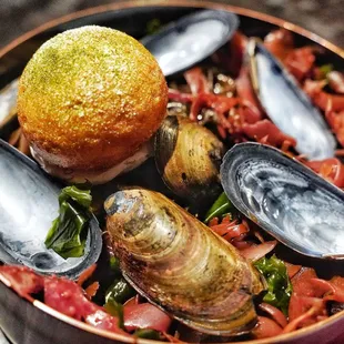 Mussel bun with myeongran jeot a fermented pollock roe and seaweed powder