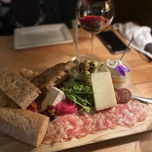 a platter of meat and cheese