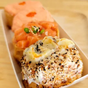 Roe in the back, salmon in the middle, and crab meat in the front