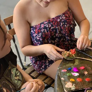 Paint a canvas or sculpt clay at the Atrium Art Cafe in Old Sacramento.  Gallery &amp; shop - eco friendly products made by Sacramento makers