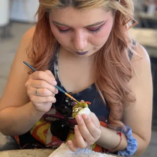 Paint a canvas or sculpt clay at the Atrium Art Cafe in Old Sacramento.  Gallery &amp; shop - eco friendly products made by Sacramento makers