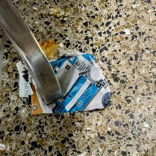 They used trash to fix a wobbly table. Enough said.