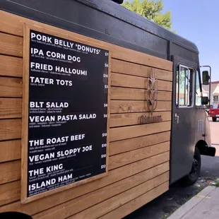 a food truck parked on the side of the road