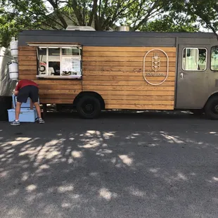 a man working on a food truck