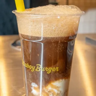 a cold beverage in a plastic cup