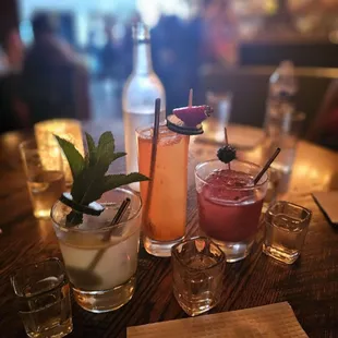 a variety of cocktails on a table