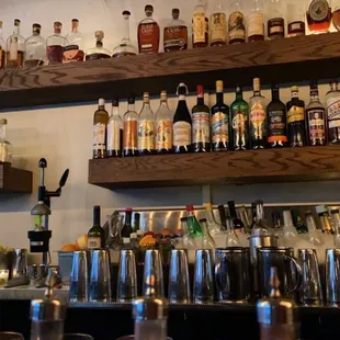 a variety of liquor bottles on shelves