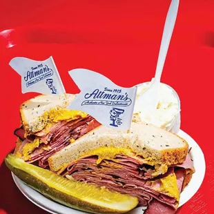 a plate with a sandwich and pickle