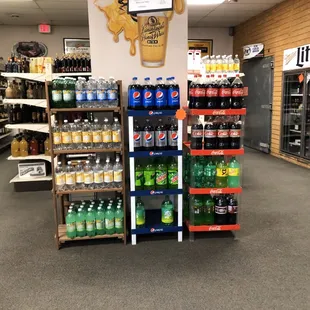 a variety of sodas and soft drinks