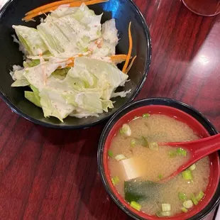 Salad with the delish house dressing , and hot miso soup