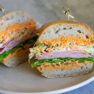 Ham &amp; Pimento Sandwich - thinly sliced North Country ham, pimento cheese, horseradish coleslaw, lettuce, and pickled jalapenos.