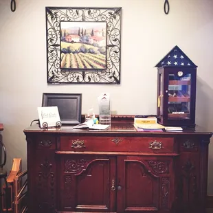 a desk with a laptop on it