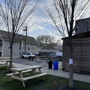 a picnic table in front of a building