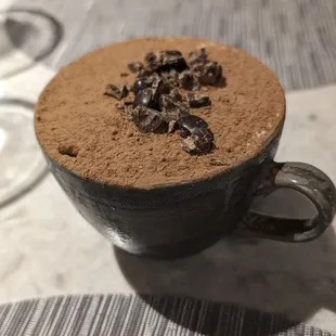 a cup of coffee on a table