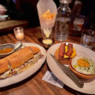 Shaved prime rib French dip, single cheeseburger with thick cut bacon &amp; egg, fries and garlic aioli