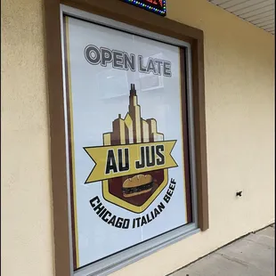 a sign for an open late restaurant