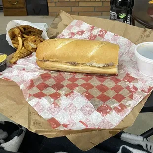 Large sausage and Italian beef sandwich with fried pickles!