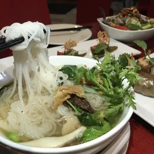 Our Hu Tieu has chrysanthemum leaves, mushrooms, yuba and rice noodles in a fragrant garlic broth.