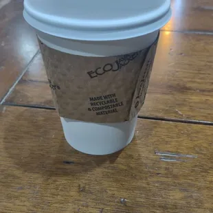 a coffee cup on a table