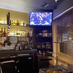 a bar with a flat screen tv