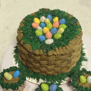 an easter basket cake and cupcakes