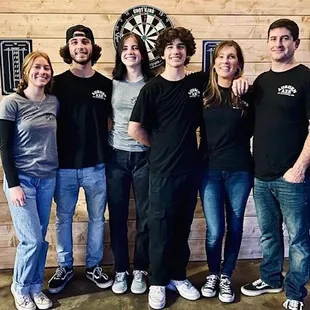 a group of people posing for a picture