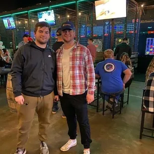 two men posing for a picture