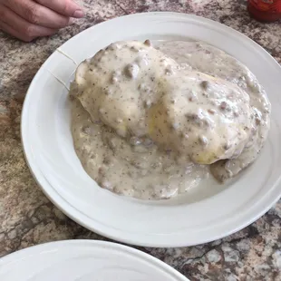 Country scramble.  It&apos;s layered with biscuit, sausage patty, scrambled eggs and sausage gravy!  Delicious!!
