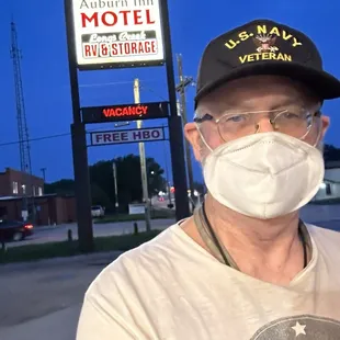 Exterior: selfie with marquee