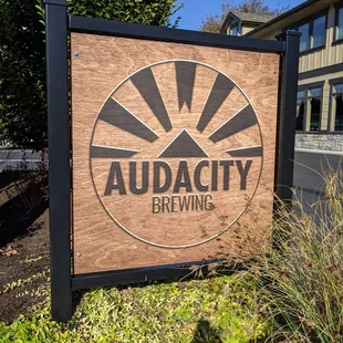 a sign for audacity brewing