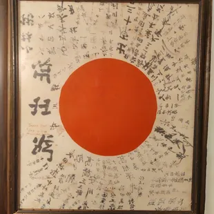 Iwo Jima Japanese flag with comment and numerous blood stains