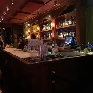 a man sitting at a bar in a bar